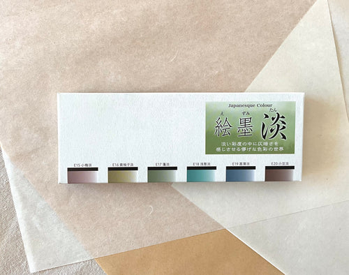Boku-Undo Ezumi Tan pale colour watercolor set box showing six soft color swatches on layered washi paper