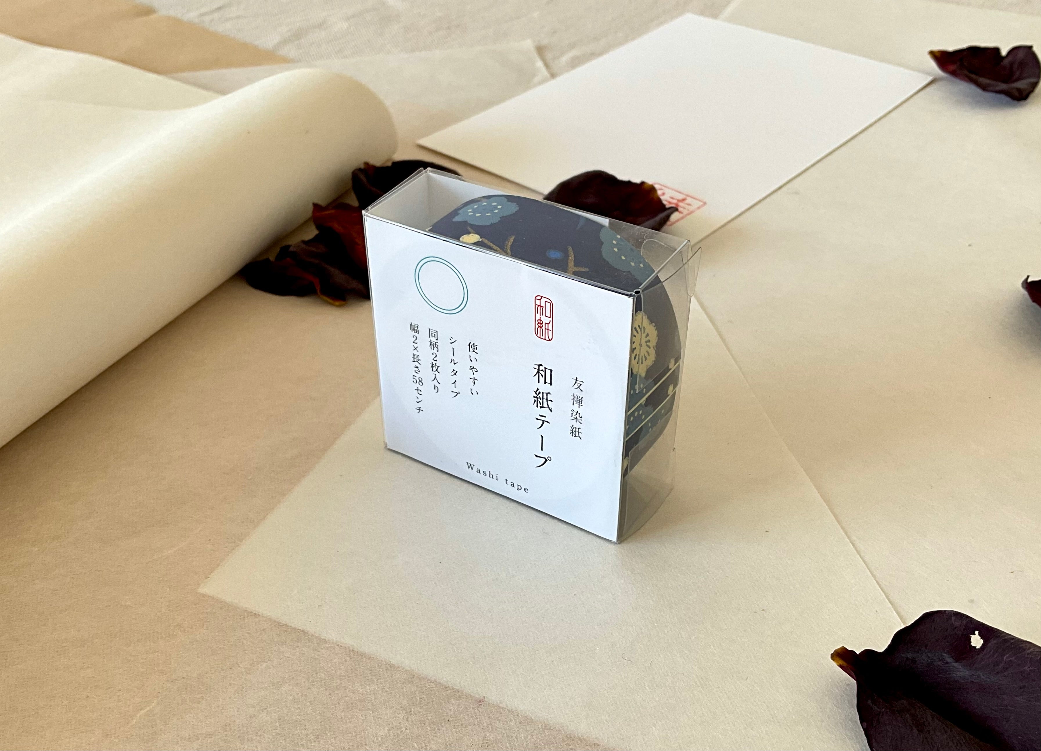 Sealed Shogado yuzen washi tape box with Japanese product label reading washi tape, two sheets same pattern, 2cm by 58cm, Navy with cream and pale blue plum blossom branches, on layered washi paper with dried rose petals