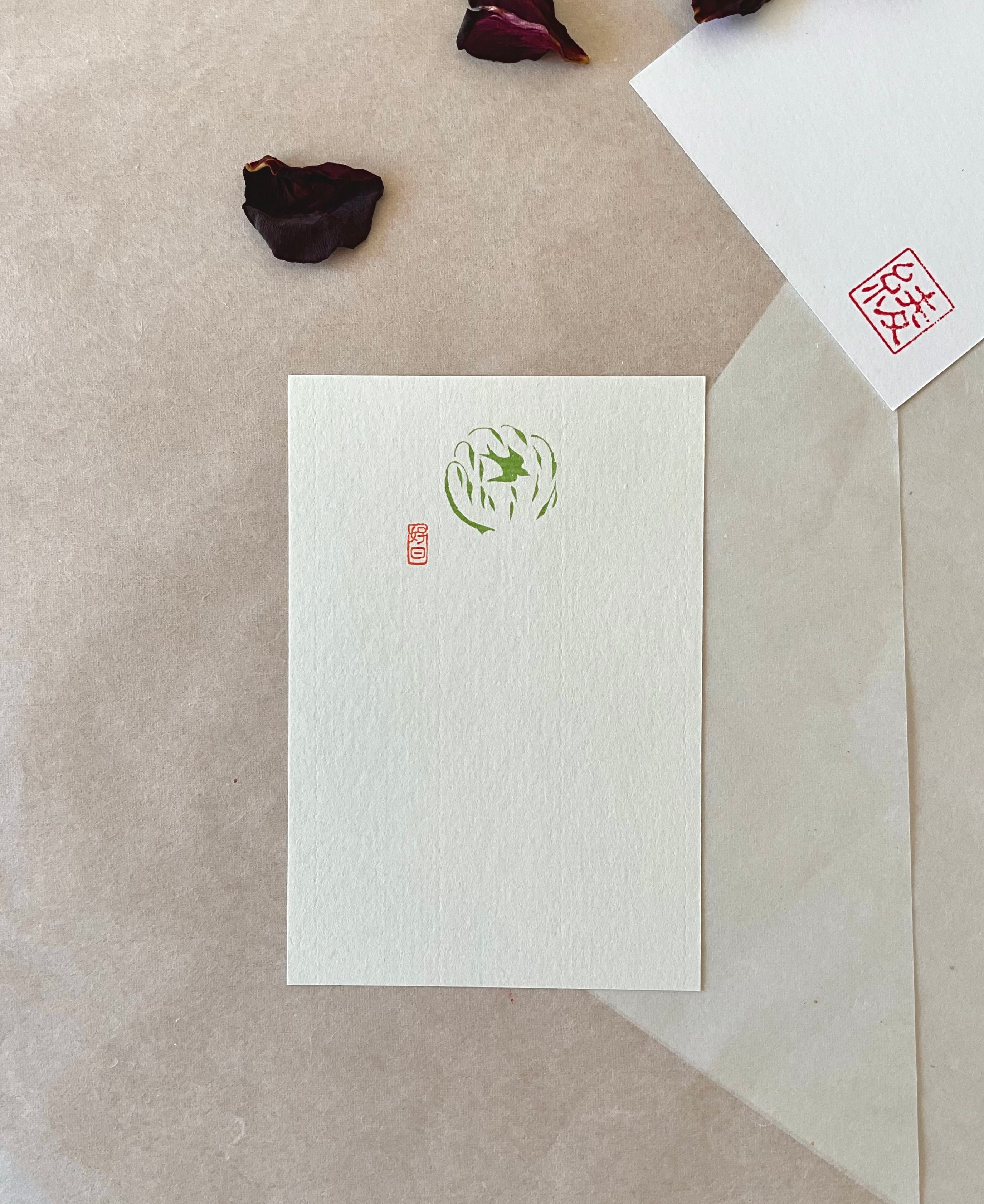 Genro Kojitsu Hagaki tsubame swallow postcard with olive green bird in leaves illustration and red seal stamp